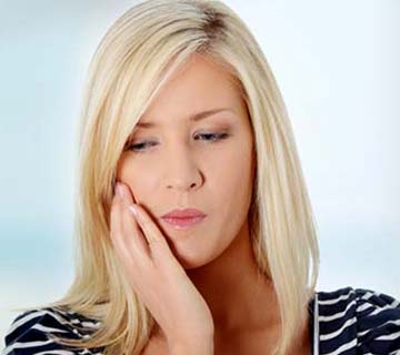 The Causes of and Treatments for Teeth Sensitivity